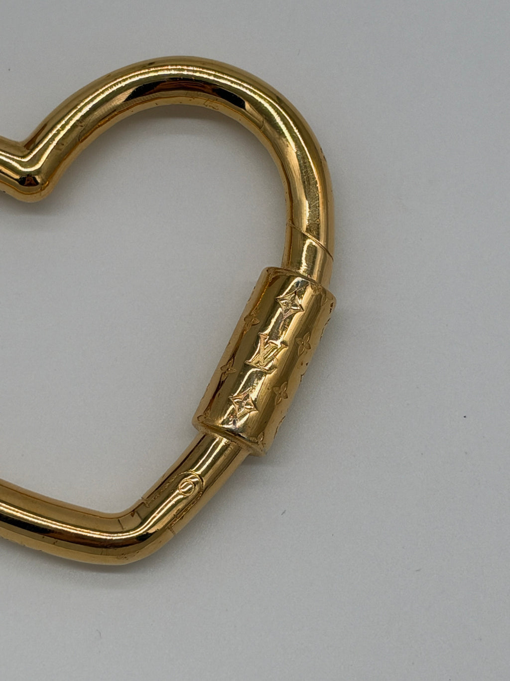 Louis Vuitton heart charm